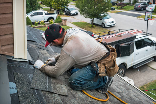 Professional Roofing technician working in Billerica, MA
